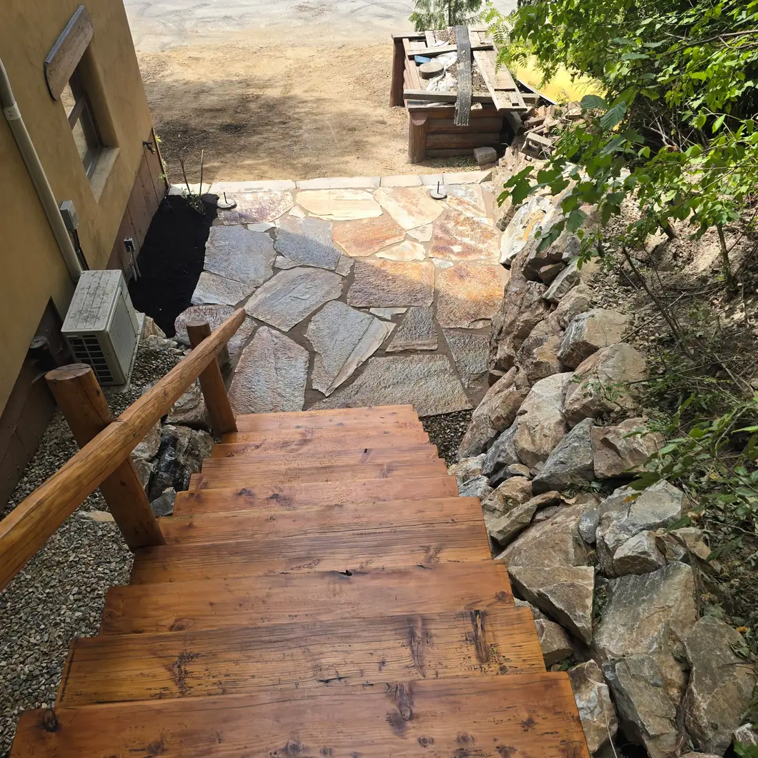 Flagstone patio and natural stone garden wall, Eagle Bay BC